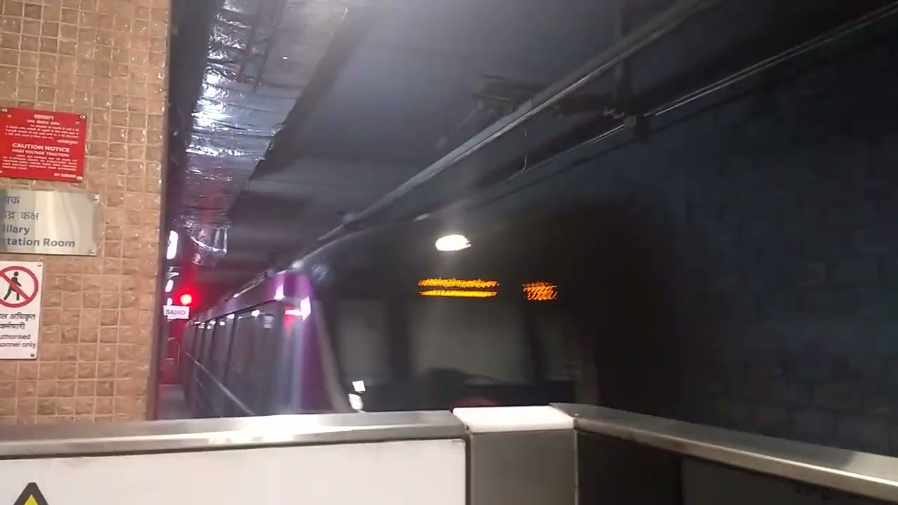 Delhi Metro's Magenta Line arriving at Kalkaji Mandir Station