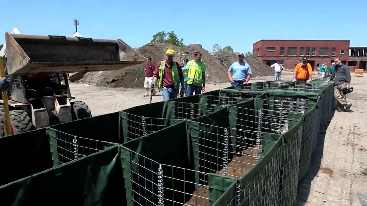 Demonstrating HESCO flood-control barriers in Cedar Rapids