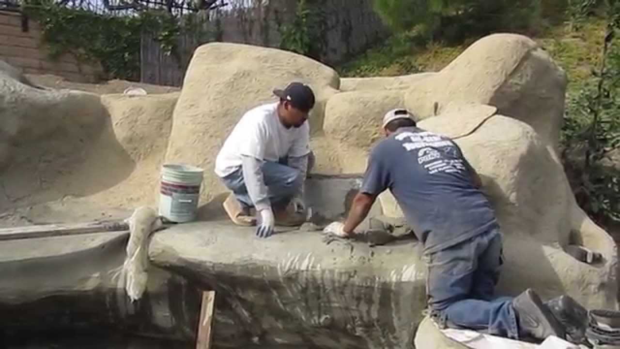 Koi pond construction part 7 - faux/artificial boulders & waterfall texture coat, waterproofing