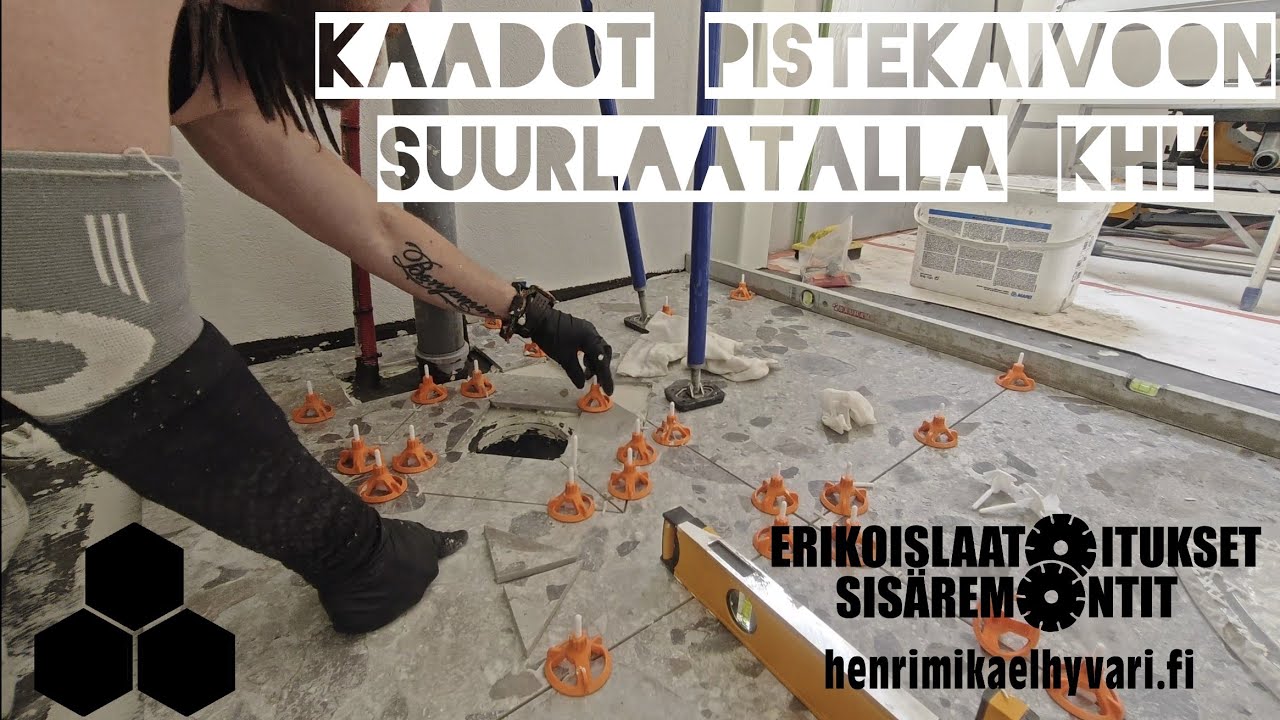 Pistekaivollisen lattian laatoittaminen suurlaatalla. Large format 60x60  tile installation