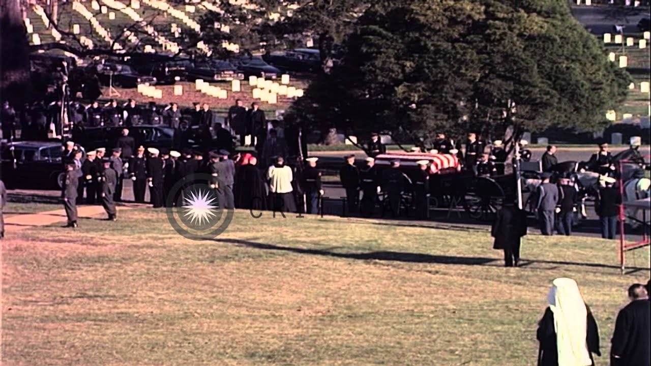 Casket bearing John Kennedy's body is removed from caisson and taken to open grav...HD Stock Footage