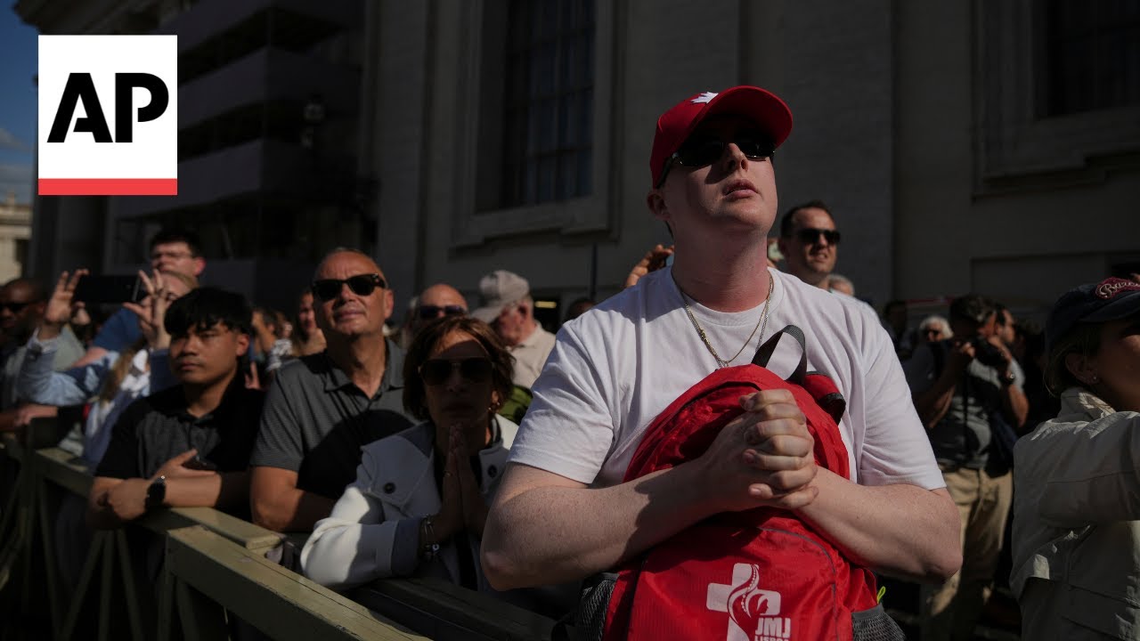 Vatican City visitors react to black smoke on Day 1 of Conclave to elect new pope