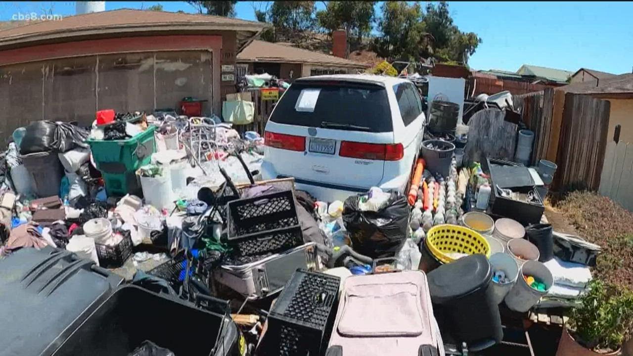 City of San Diego crews begin cleanup of hoarder home