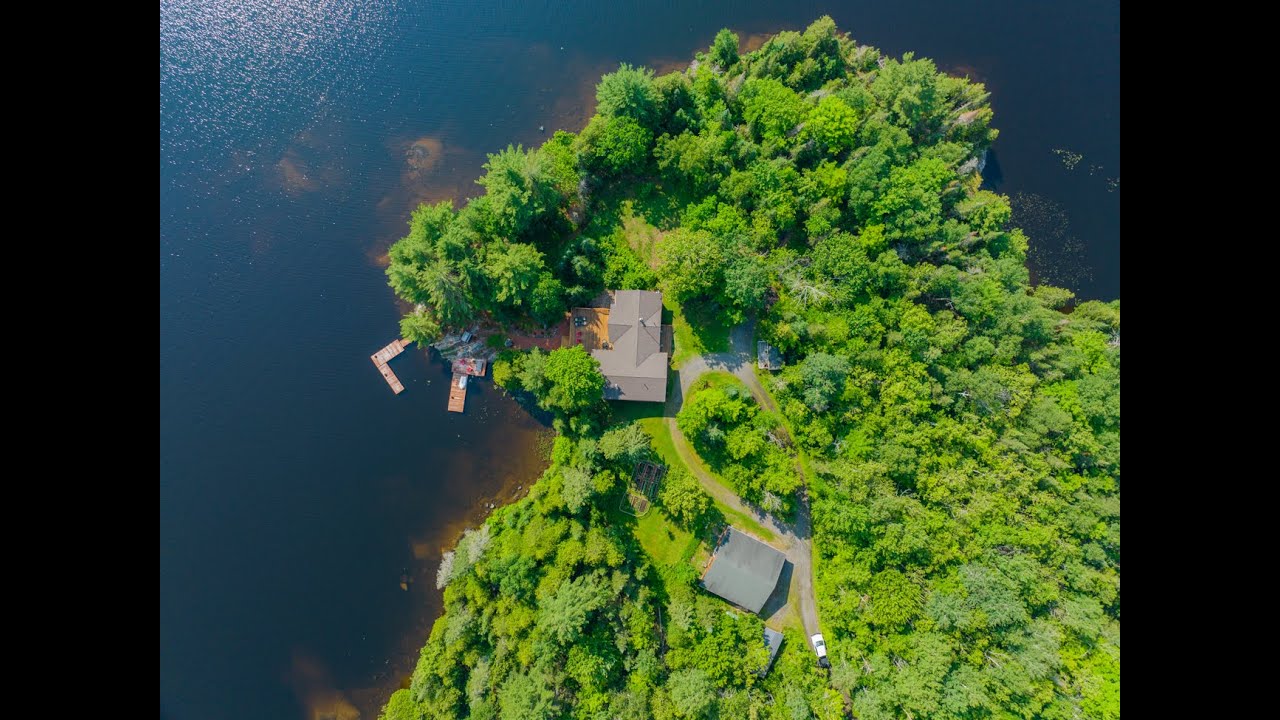 85 Cole Point Trail - Lake Manitouwabing. Lakehouse, 3 car garage, 5+ acres & 1540 feet of shoreline