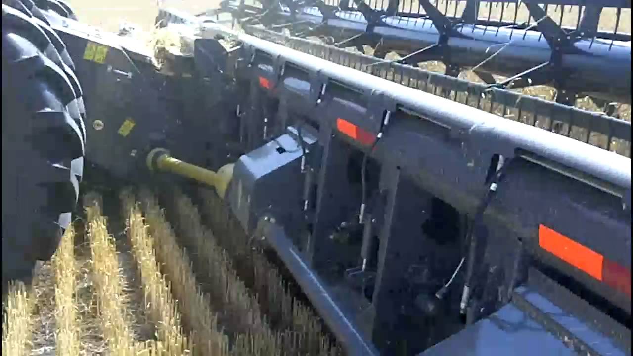 9795 with 9250 35' flex draper