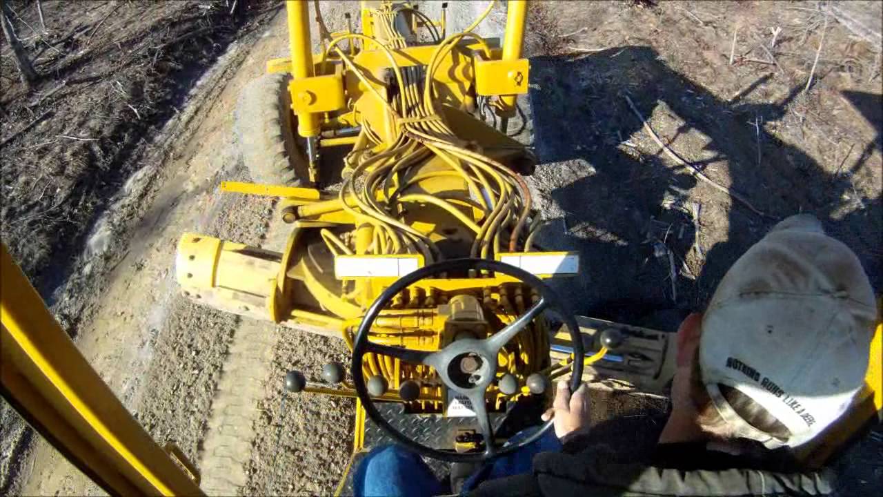 Motor Grader Grading Logging Road