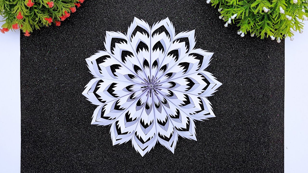 Glistening & Great Your Guide to Paper Snowflakes | Paper Snowflake Christmas Decorations