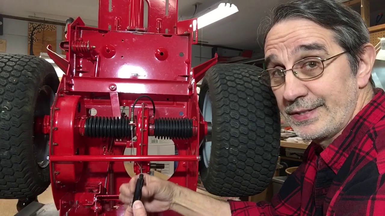 272. Installing the spring on the brake arm for a Snapper RER