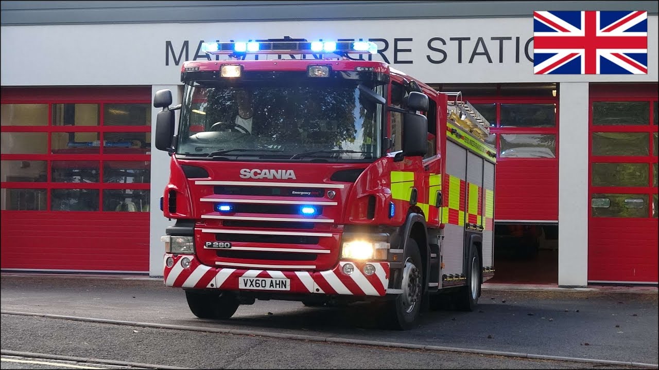 Fire engine responding with siren and NEW lights on a Scania P280