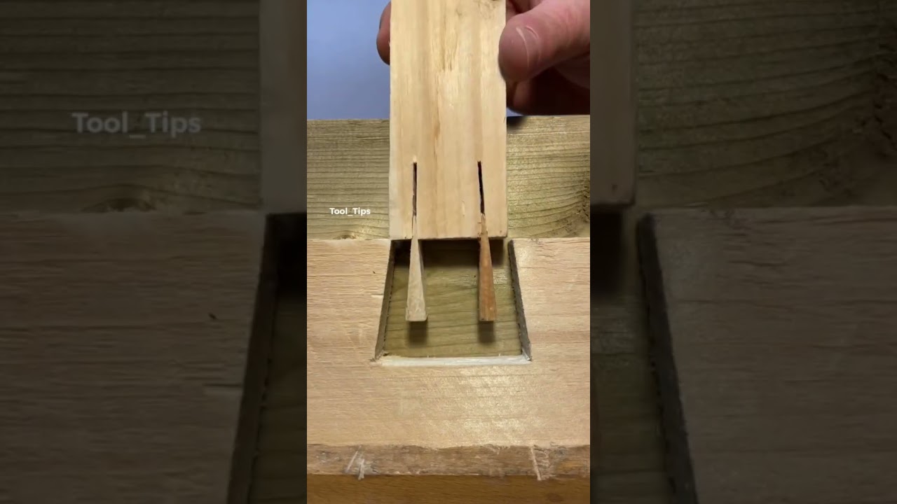 The Setup: Inserting the two small wedges into the pre-cut slits of the tenon.