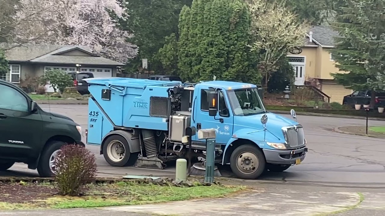 Tymco 435 Street Sweeper sweeping on Saint Patrick’s Day