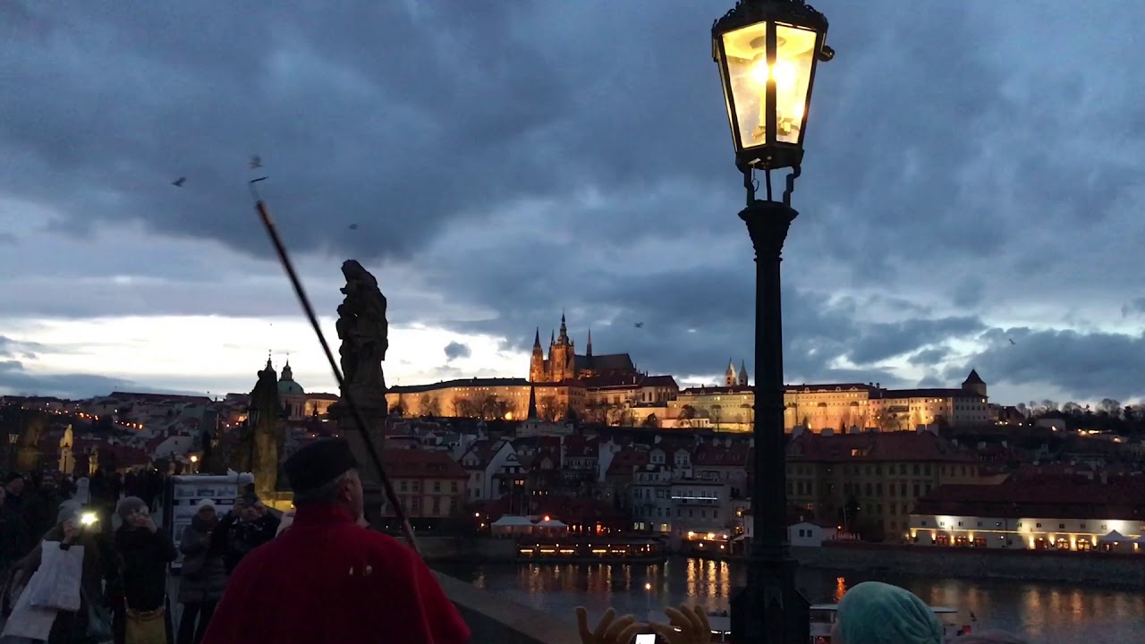 Lamplighter (lamp&aacute;ř) on the Charles Bridge, Prague