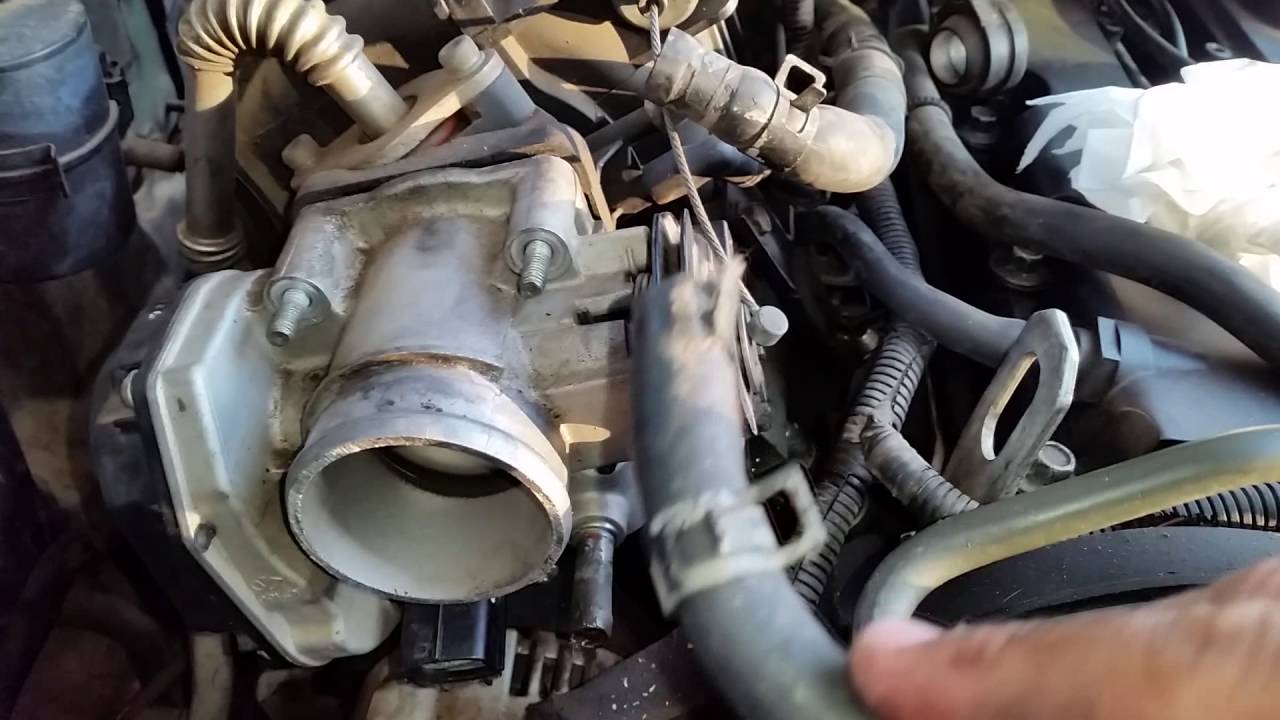 تنظيف بوابه الاوبترا Throttle Body ( هااااام تحتاج الى برمجه بعد التنظيف )