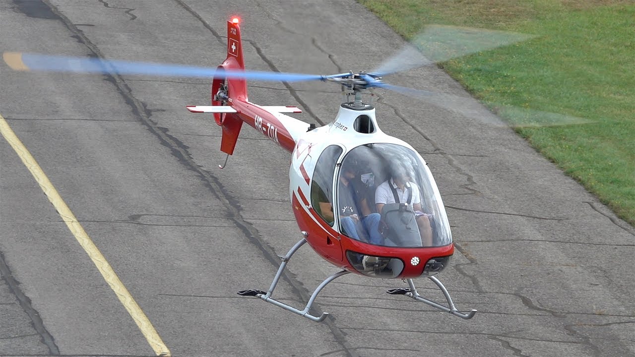 Like an RC 🚁 Swiss Helicopter Guimbal Cabri G2 landing at Nancy airport