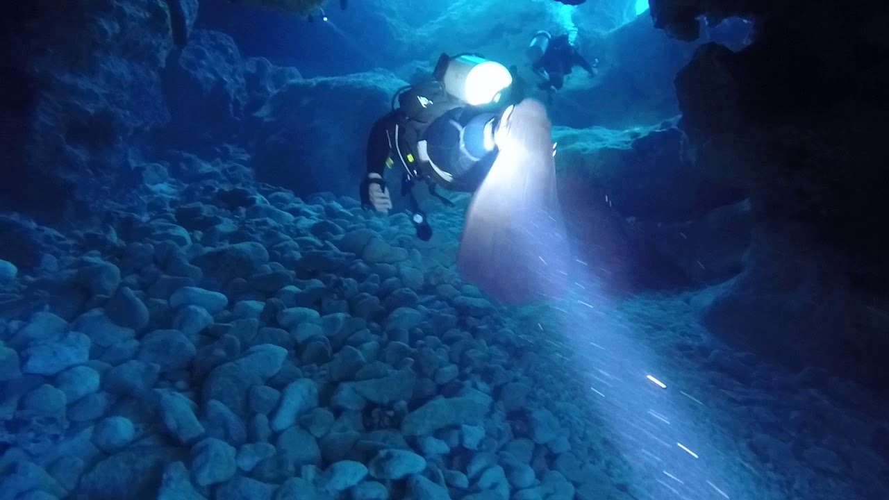 Cave travel with INNOBEAM waterproof flashlight and video light