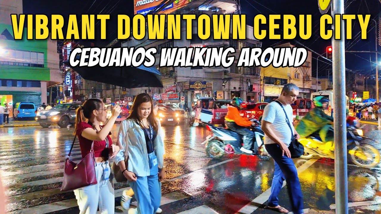 CEBUANOS WALKING AROUND AT DOWNTOWN CEBU IN THE EVENING. VIBRANT IN THE EVENING.  VIRTUAL TOUR