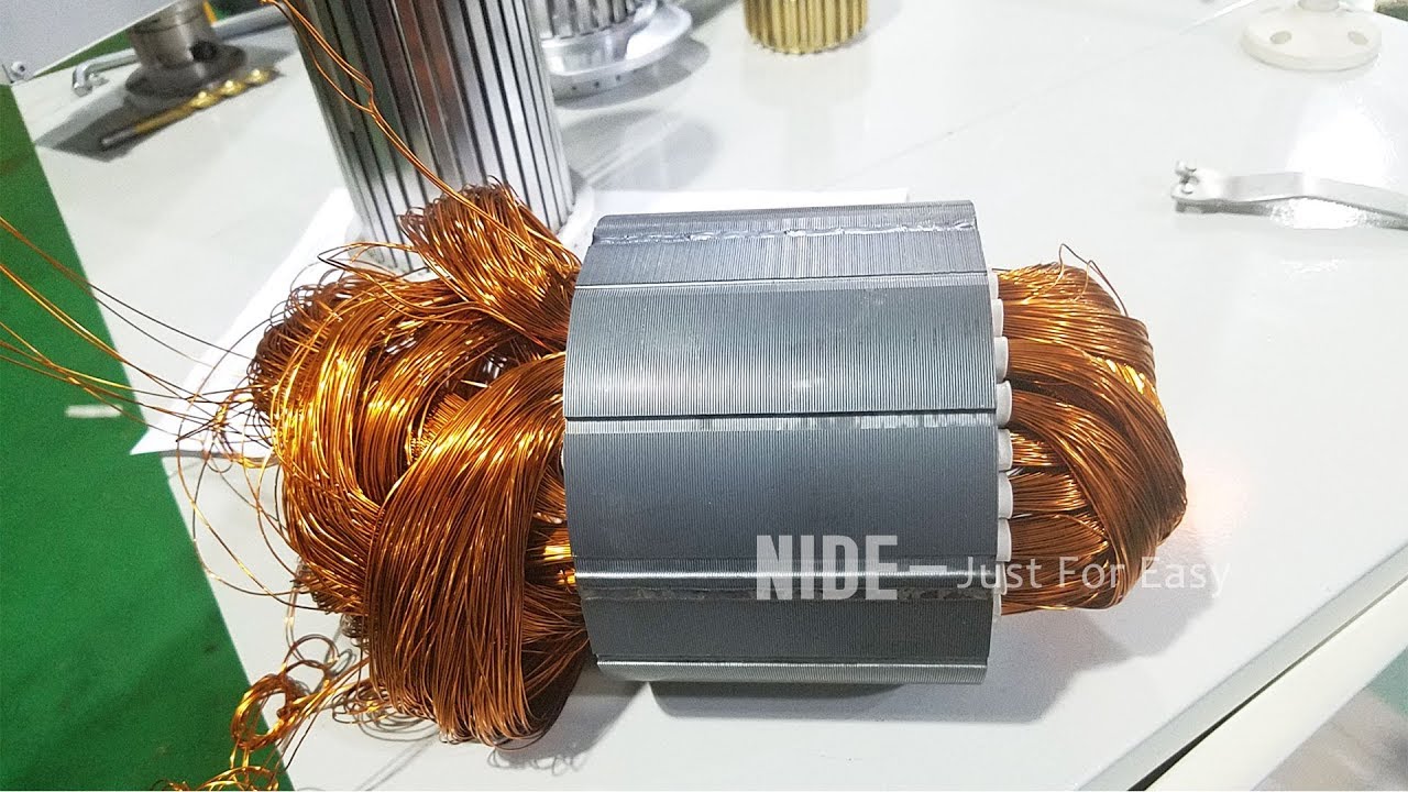 motor manufacturing : stator coil winding inserting machine