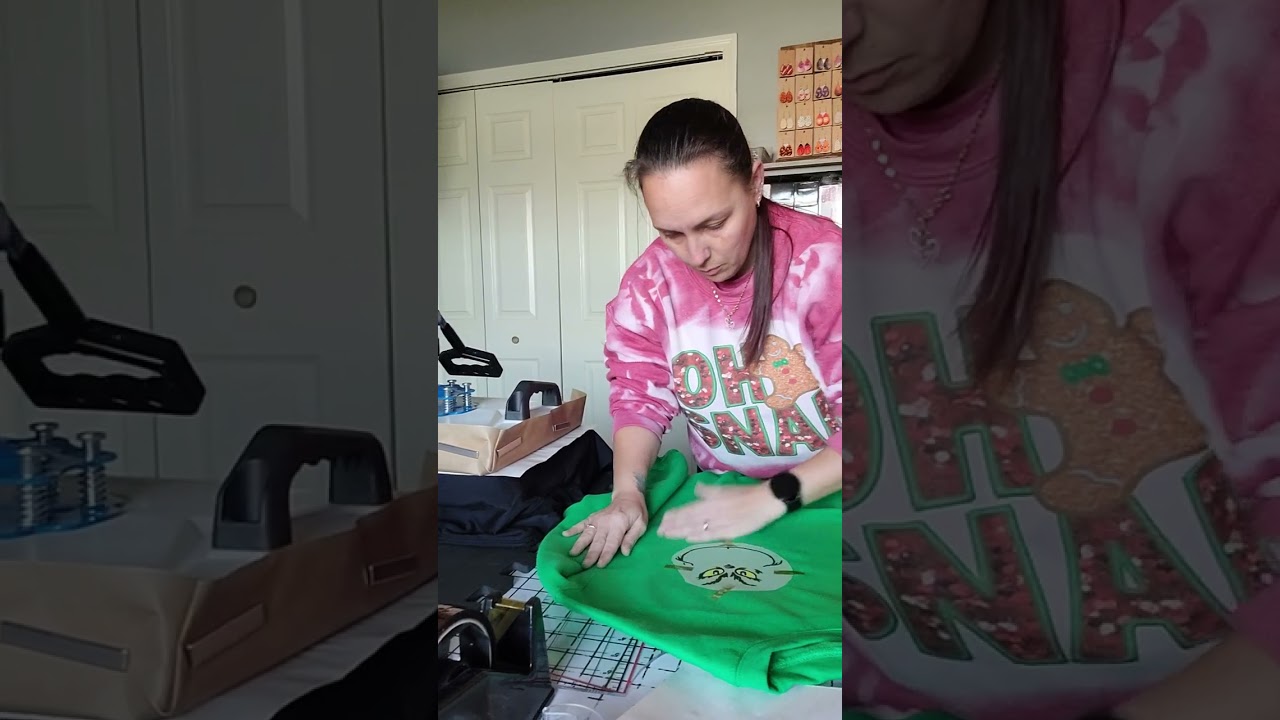 Pressing DTF designs on a shirt and crewneck #dtf #grinch #Christmas #gingerbread
