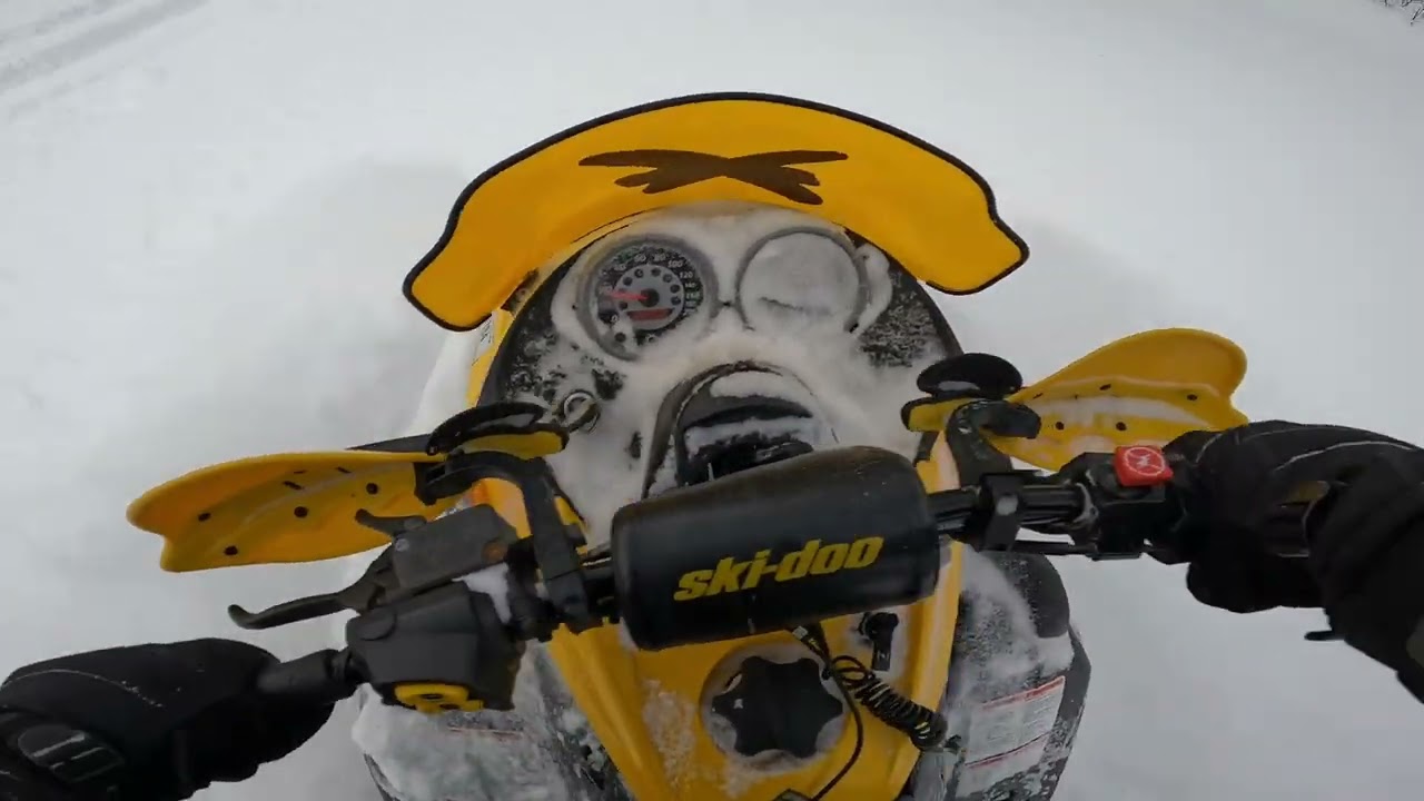 SNOWMOBILING IN POWDA