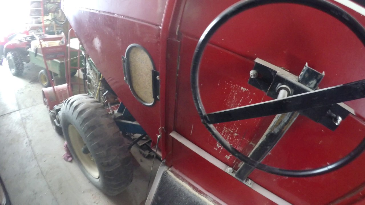Refueling the Corn Burner With Corn and Wood Pellets