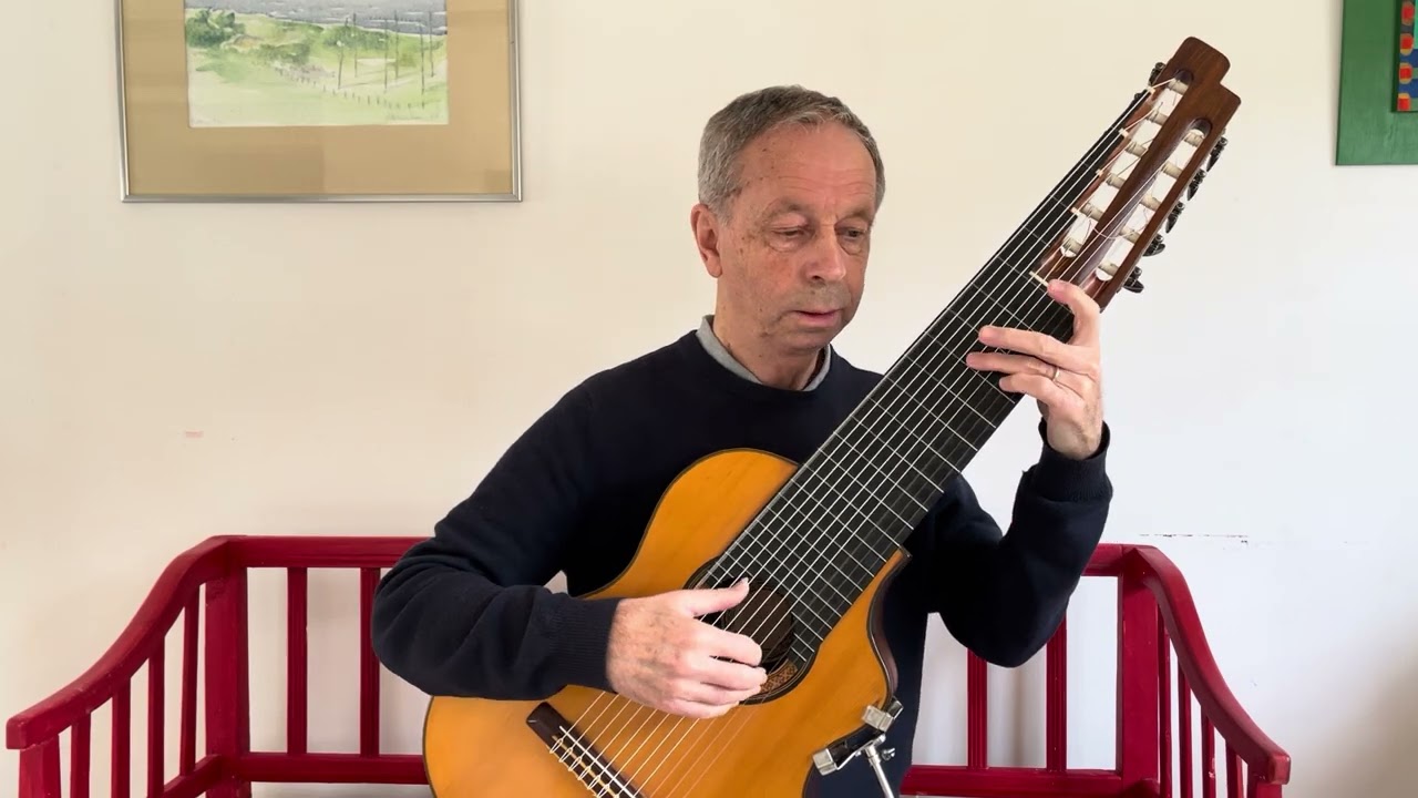 Maestro Bach : Gigue from cello suite no 1. G&ouml;ran S&ouml;llscher,11-str alto guitar.