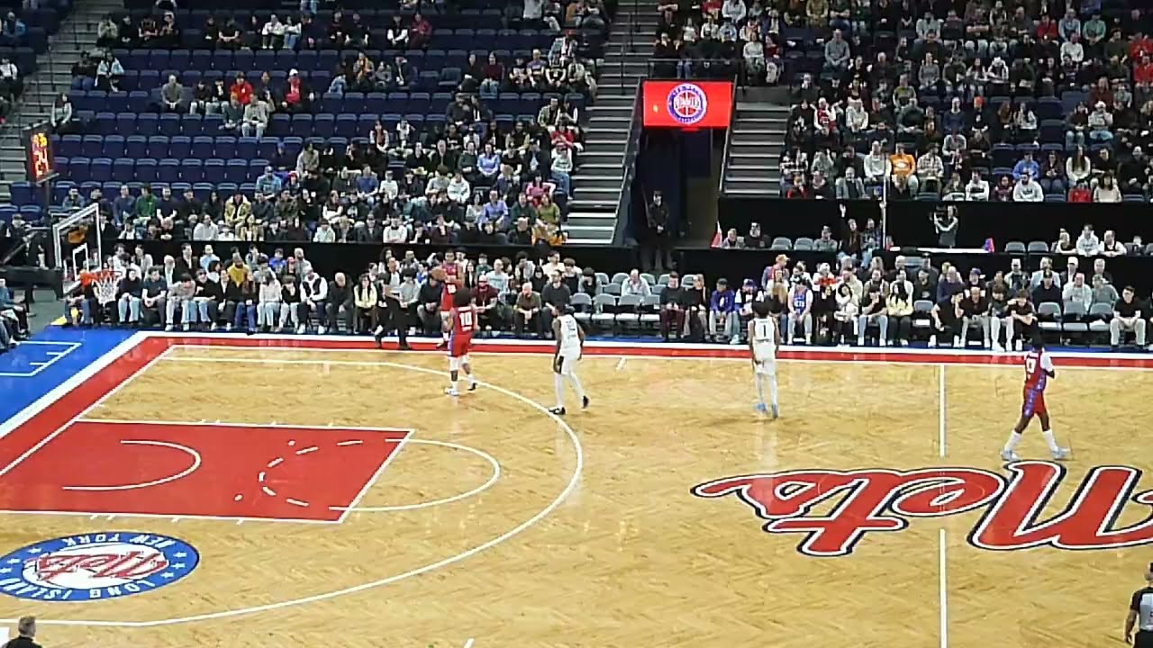 Wisconsin Herd's Cormac Ryan and Long Island/Montreal Les Nets' Trevon Scott sink 3-pointers in 1st
