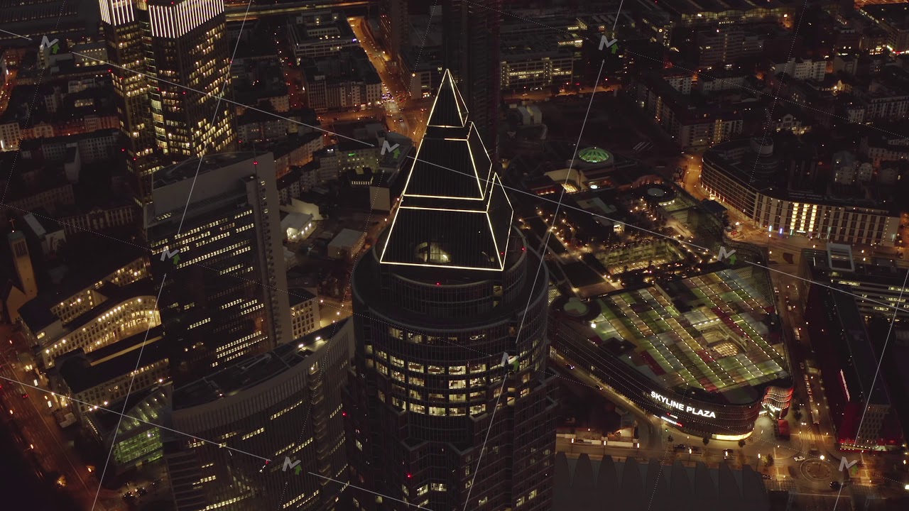 AERIAL: Messeturm in Frankfurt am Main, Germany at Night, Big City, Lights, Skyscraper June circa