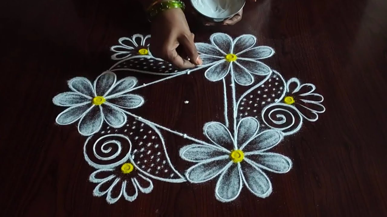 2 beautiful daily kolams (5×3) dot's....