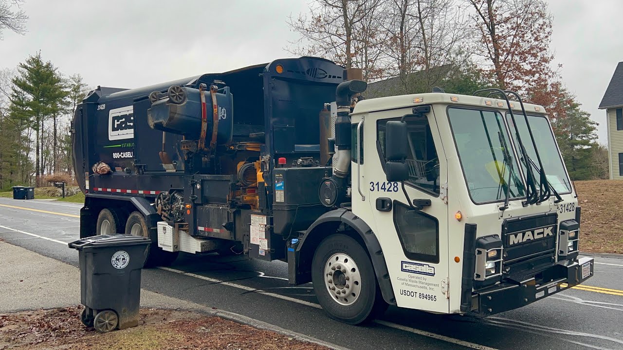 Casella’s Mack Garbage Truck Packing Recycling In The Woods