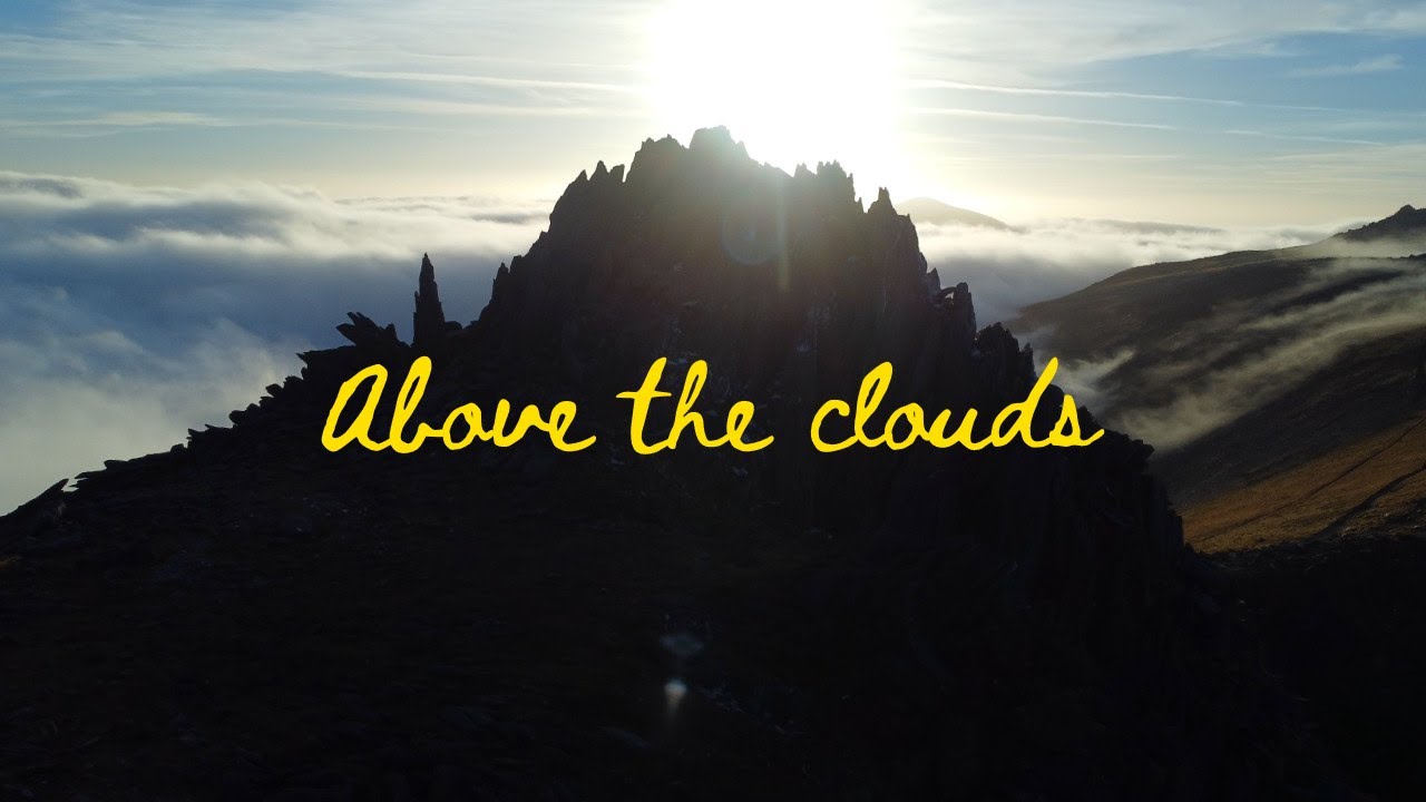 Above the clouds: Hiking in the Glyders, Snowdonia. Drone 4K