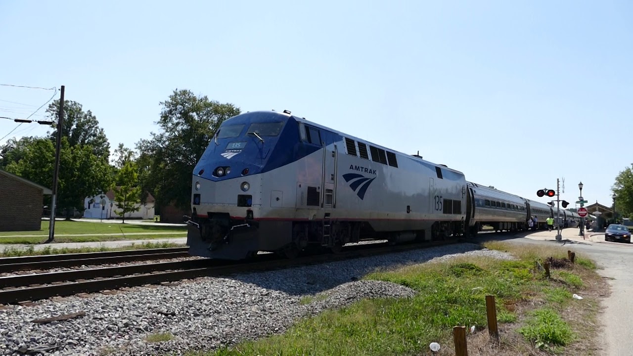 Amtrak 135 with private car on rear.