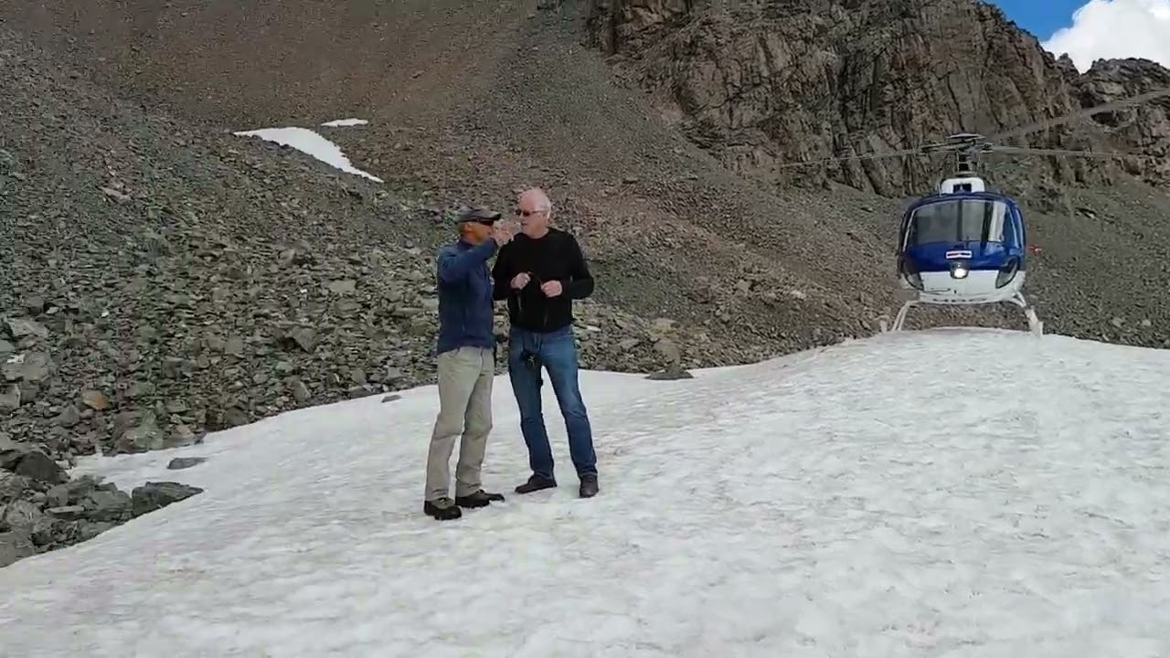 Helicopter Landing on Mount Cook Glacier.