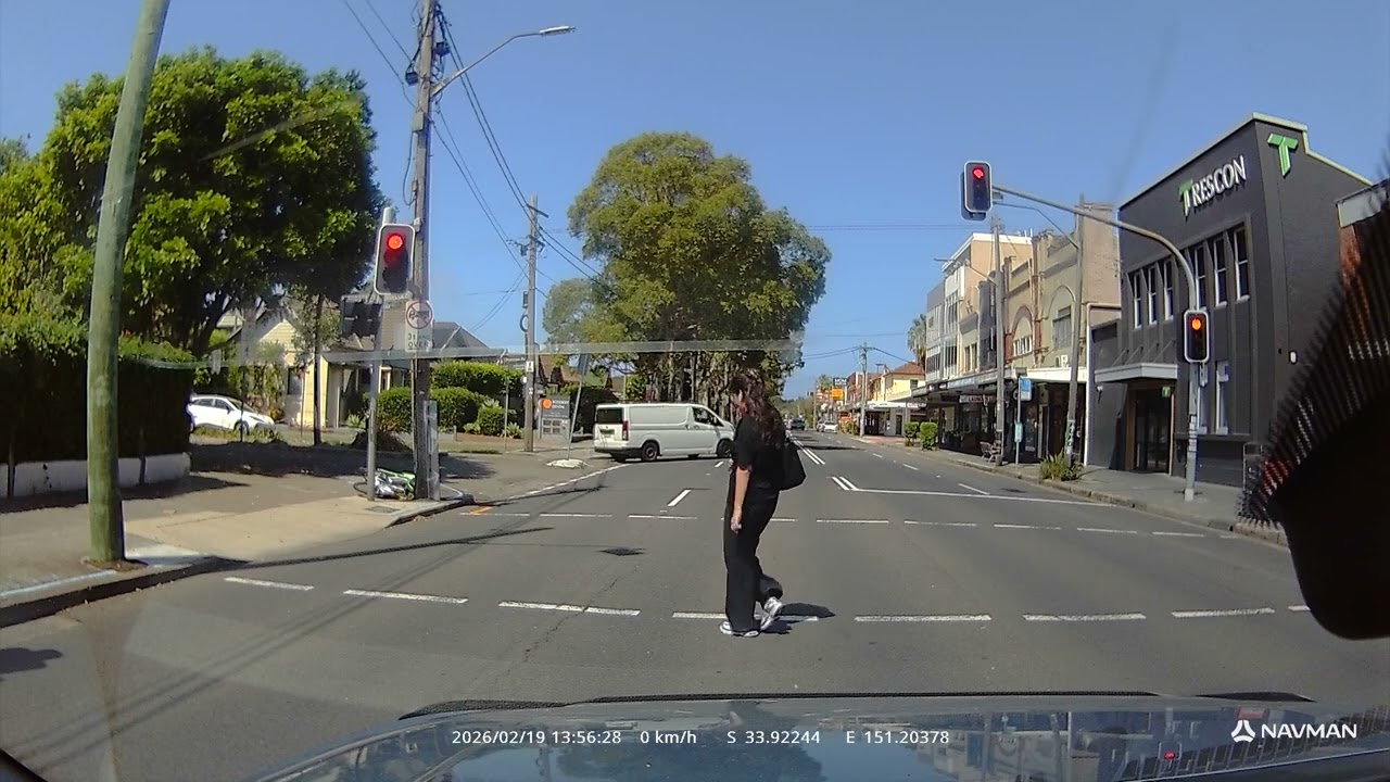 highly Illegal bike crossing a red light intersection