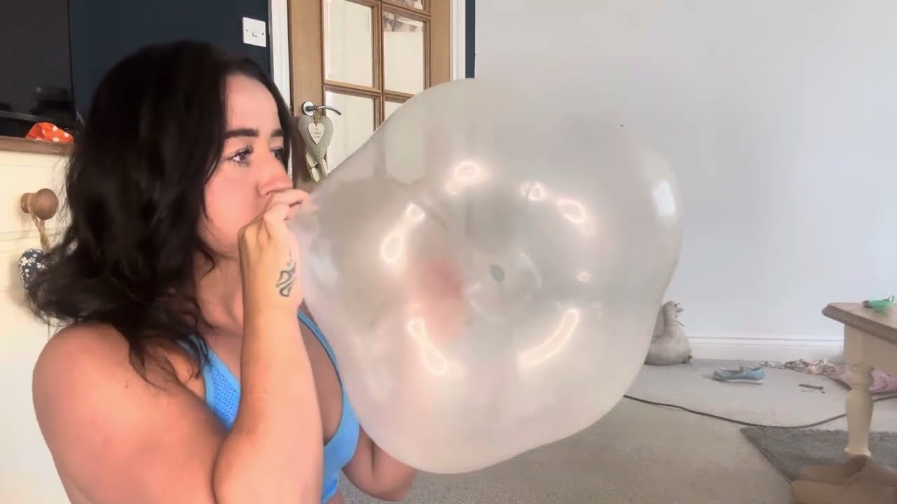 Blowing up a clear geo blossom balloon