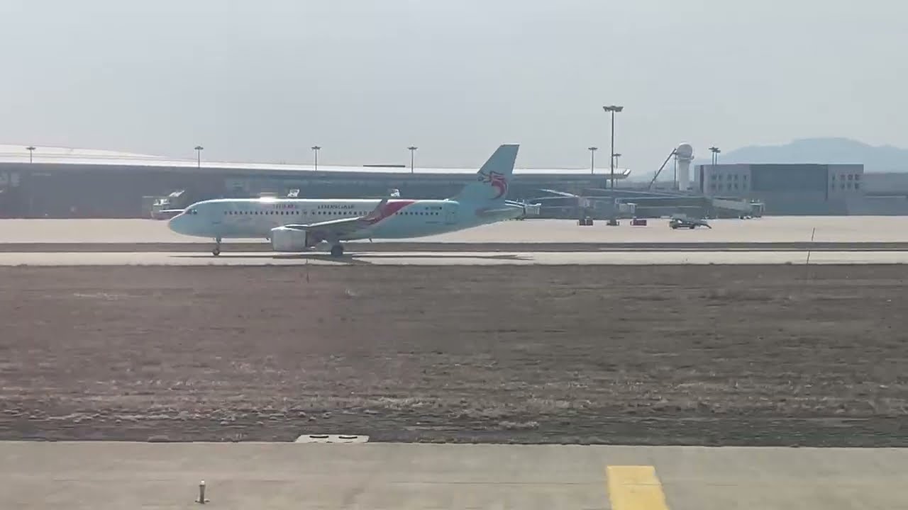 Yantai (YNT) China. Final Approach to Airport, Landing at Taxi to Terminal.  3 April 2025