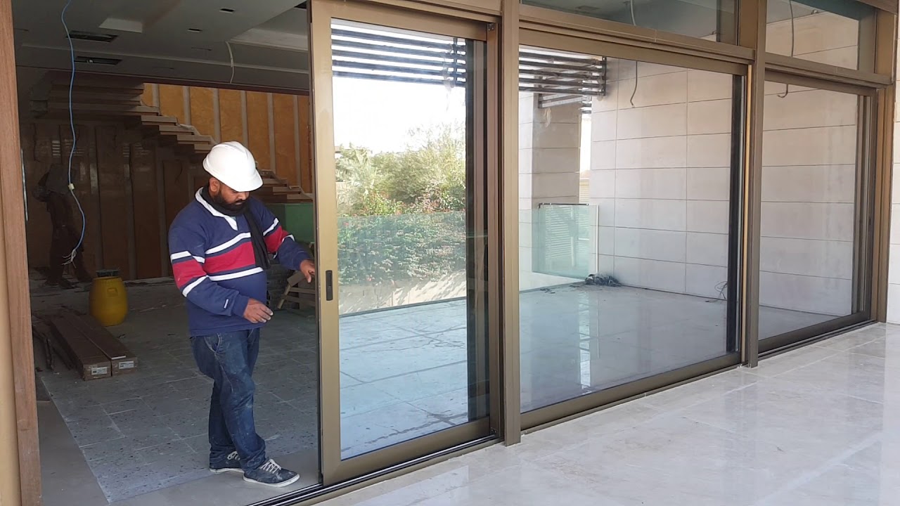 من منتجات مصنع كريتفال - أبواب سحاب محكمة الإغلاق بربر-نظام تكنالLeft and Slide Door TECHNAL System-