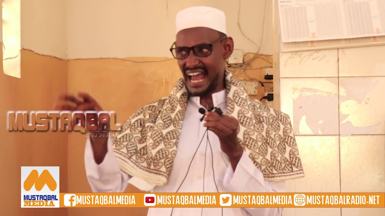 'DILKA QOF MUSLIM AH'[ CIWAANKA QUDBADDII JIMCAHA EE SHEIKH CABDI XAYI, OO DHAMEYSTIRAN.