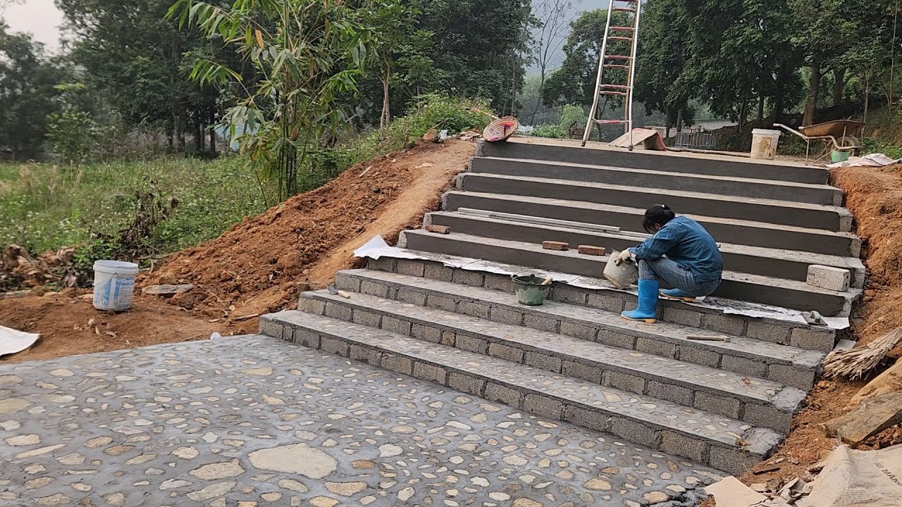 Constructing a staircase leading up to the T16 farm.