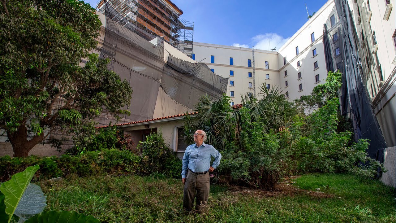 The Plaza Coral Gables engulfs single family home
