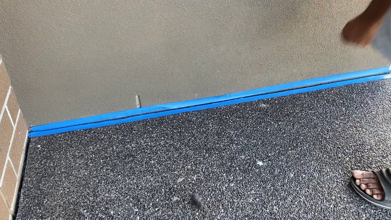Caulking around house foundation