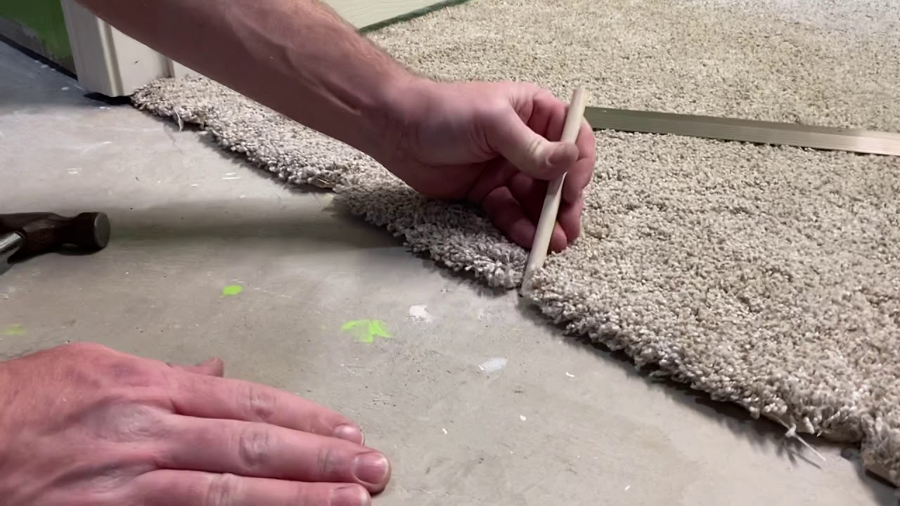 How to attach a door threshold to a concrete floor.  Carpet to bare concrete transition.