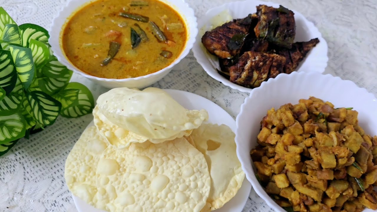 Today's lunch menu :  Ayala Masala Fry, Chena Mezhukku Puratty, Varutharacha Sambar, and Pappadam.