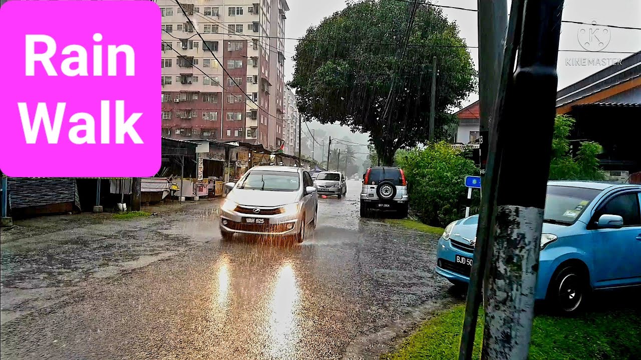 Walking in the Rain (Vid-36) at Bukit Belachan, Ampang in Kuala Lumpur, Malaysia.