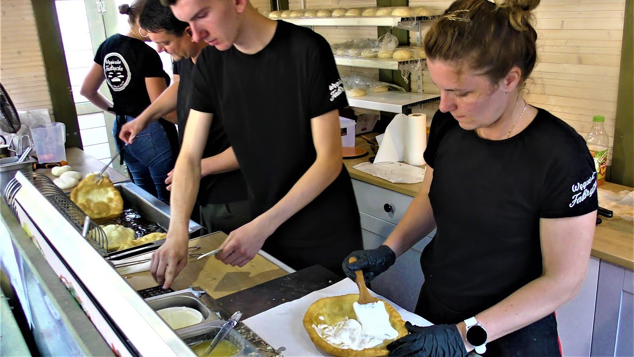 Street Food in Gdansk, Poland. Cooking Salty and Sweet Langos