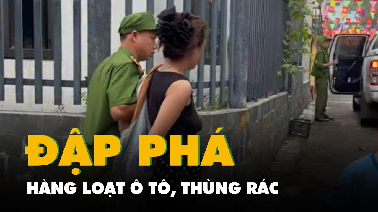 Người phụ nữ cầm rựa, gậy đập phá hàng loạt ô tô, thùng rác