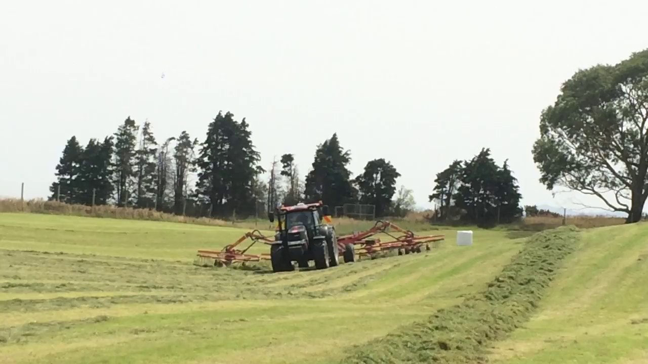 Kuhn GA13131 4 rotor rake in action in Southland.