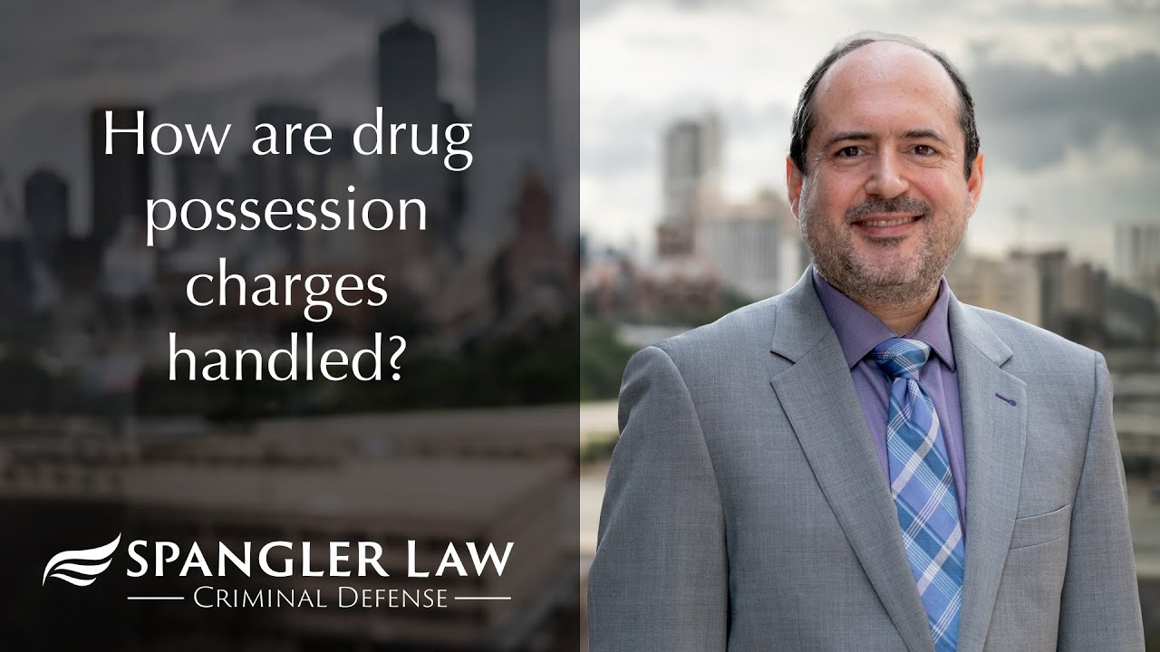 How are drug possession charges handled?