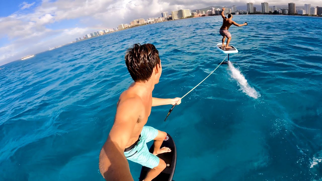 EFoil towing with dolphins in Waikiki