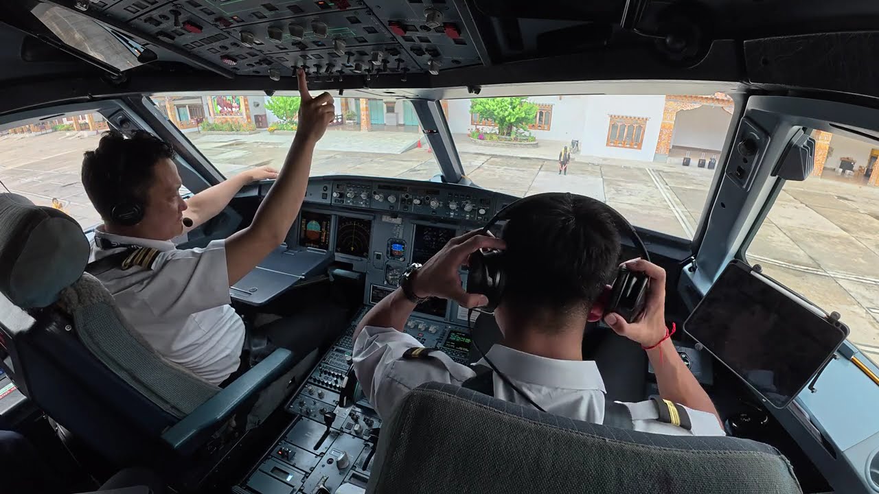 Flight Deck view of Bhutan Airlines Pilots flying Airbus A319 at Paro Airport, Bhutan!