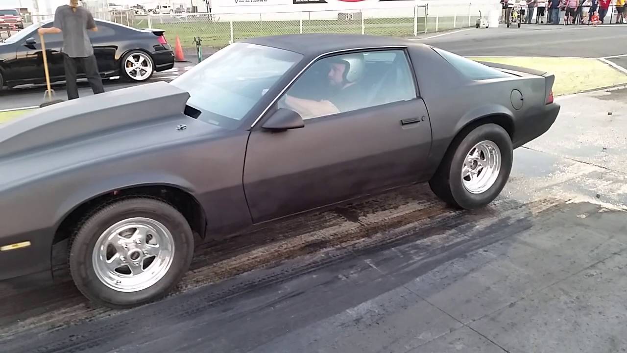 Third gen camaro stock suspension , 9.5-1 comp , vortec head 383ci sbc . 11.96  on 87 octane.